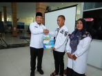 wabup-siak-husni-merza-bersama-kepala-dinas-lependudukan-dan-pencatatan-sipil-disdukcapil-hasmizal