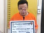 tersangka-penggelapan-mobil-kh-saat-diamankan-di-polres-kampar