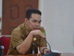 plt-kepala-dinas-pendidikan-provinsi-riau-erisman-yahya